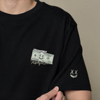 Ricky is Clown Dollar Wealth Flows Embroidered Tee