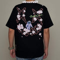 Ricky Is Clown Floral Shadows Weave Through Torn Smiley Tee