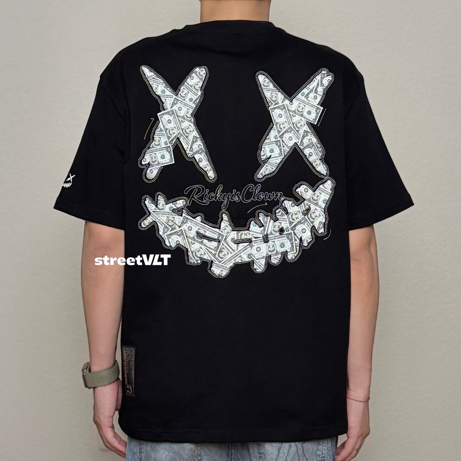 Ricky is Clown Dollar Wealth Flows Embroidered Tee