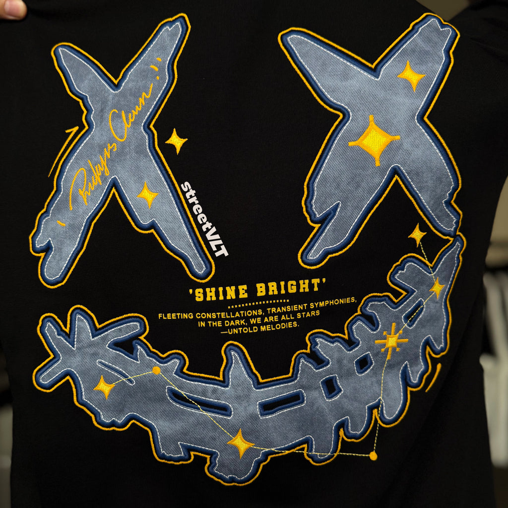 Ricky is Clown Azure Spark Blue Starburst Embroidered Tee